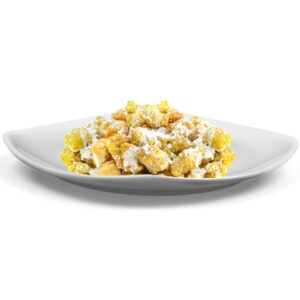 gnocchi alle carote con burro e salvia bio su piatto bianco